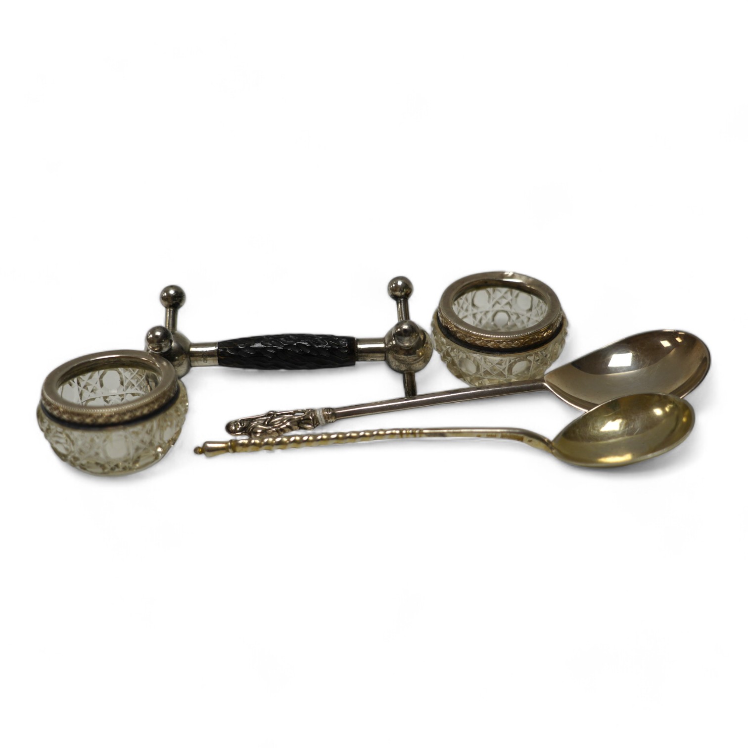 A late 19th century Russian engraved 84 zolotnik spoon, dated 1890, 16.8cm, a George V silver apostle spoon, together with three other items including silver mounted glass salts. Condition - poor to fair to good